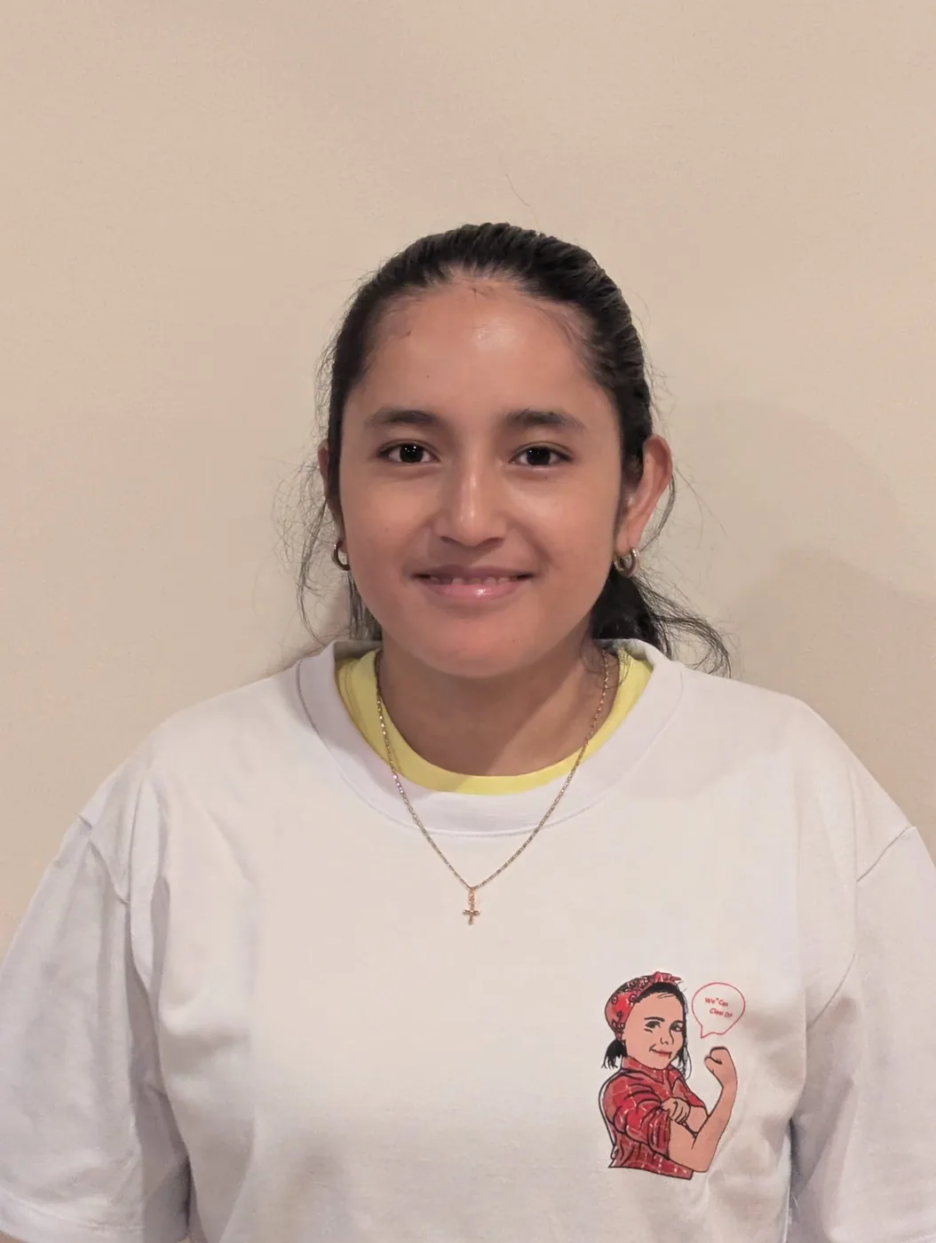 DA Maids crew member in a tee with a yellow collar