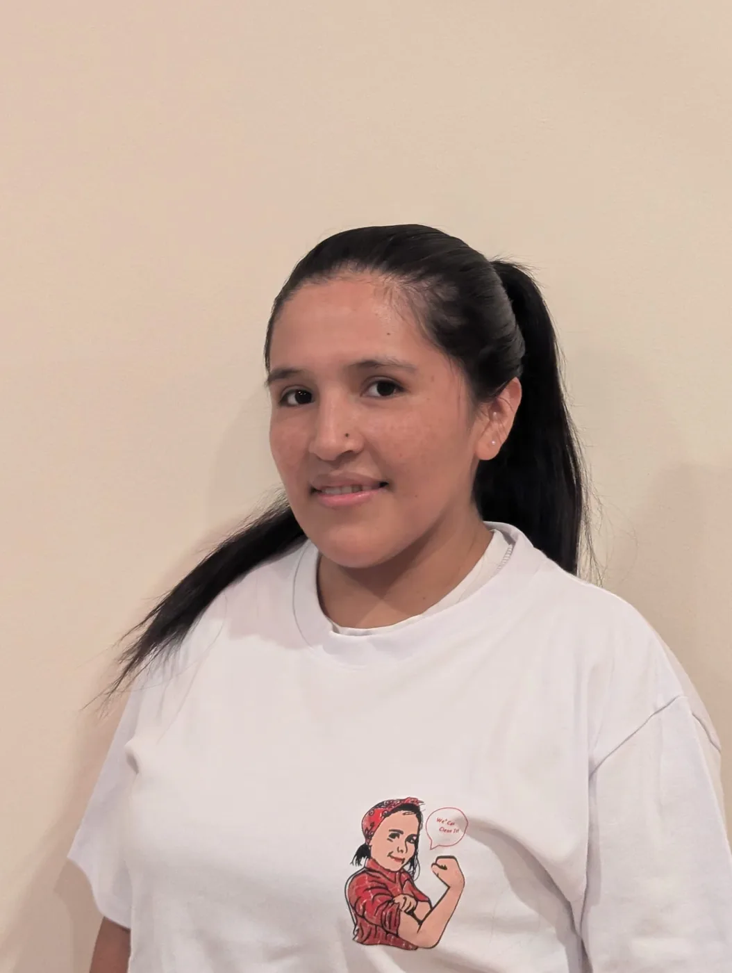 DA Maids crew member with her hair in a ponytail