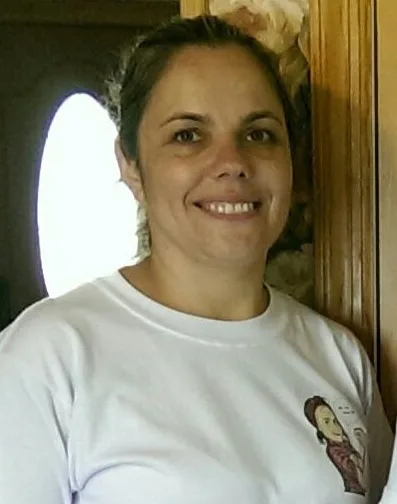 DA Maids crew member standing in a doorway